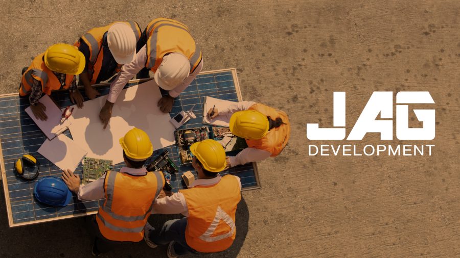 JAG Developer header image with construction workers working on a blueprint